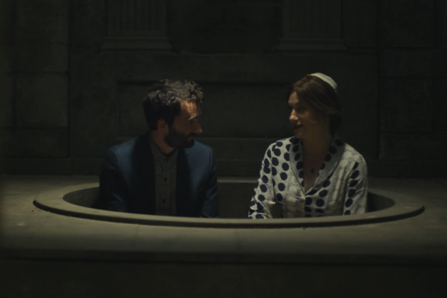 Josh and Raquel in the empty mikveh.