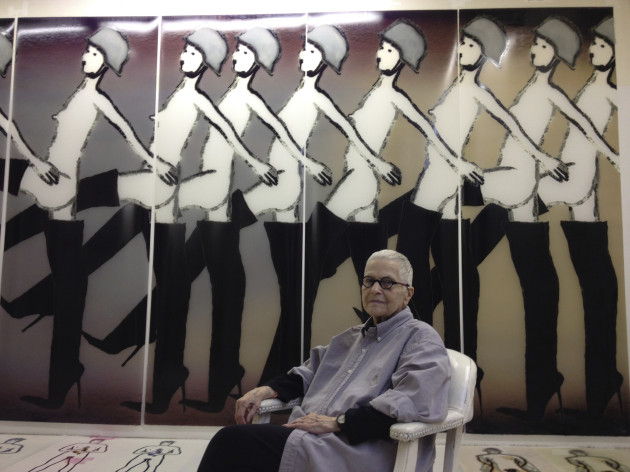Ida Applebroog in front of "Marching Girls," from the "Ethics of Desire" series