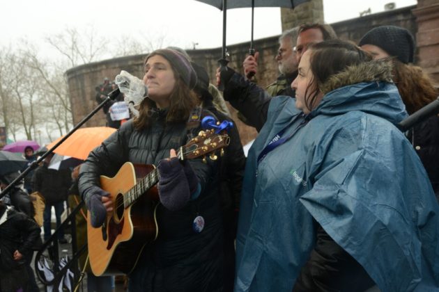 "Singer/songwriter Chana Rothman(left) and Rabbi Rachel Grant Meyer, Director of Education at HIAS, the global Jewish nonprofit that protects refugees, participate in the Jewish Rally for Refugees in Battery Park, New York", photo by Gili Getz