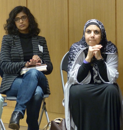 Two women at the "Communicating Contradictions: Lean In, Rise Up, Jump In, and Listen!" workshop. Heba Macksoud of South Brunswick N.J. (right) sought advice after verbal bullying twice in one week. Photo credit: Amy Stone. 