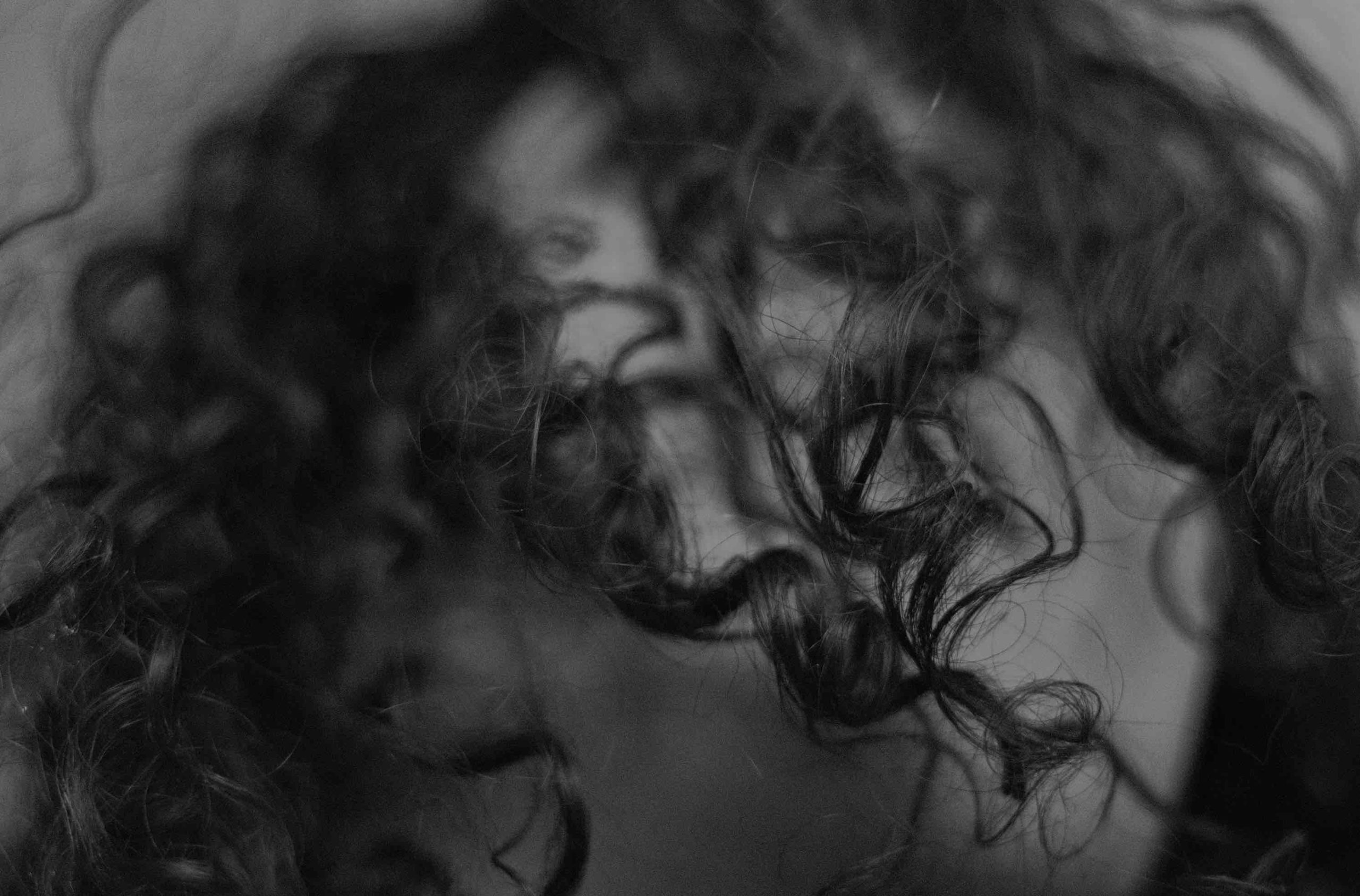 Image: dark curly hair